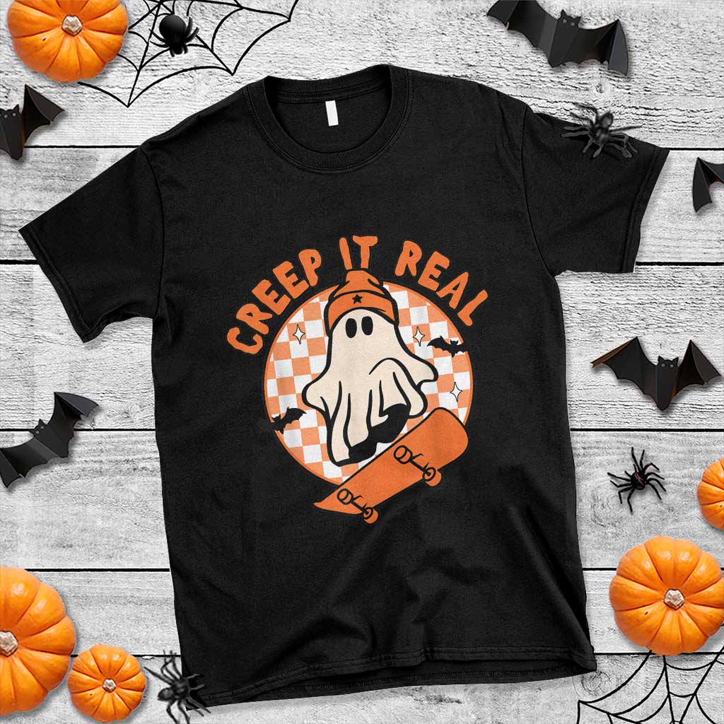 Black Halloween t-shirt with orange “CREEP IT REAL” ghost skateboard graphic