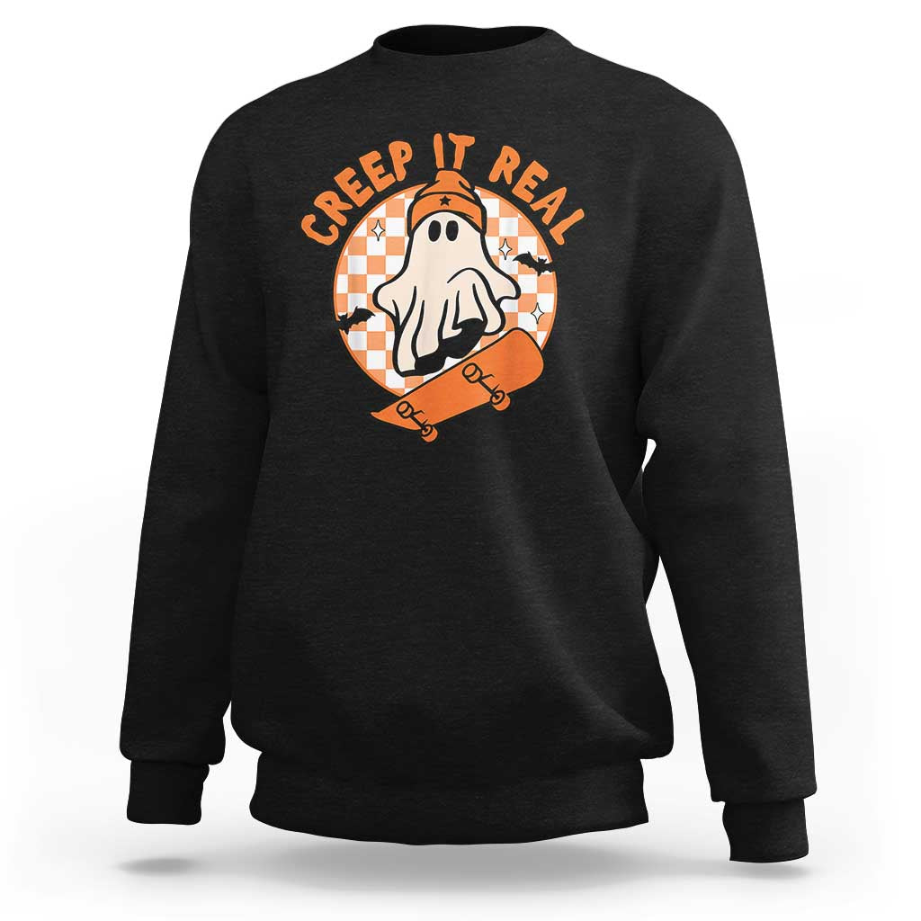 Halloween graphic crewneck sweatshirt in black with orange ghost skate logo