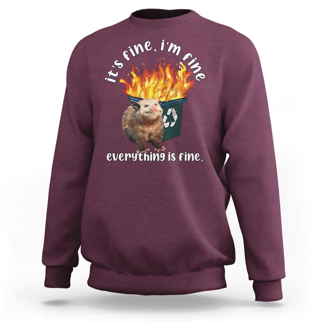 Maroon unisex sweatshirt with opossum graphic, flames and “everything is fine” text