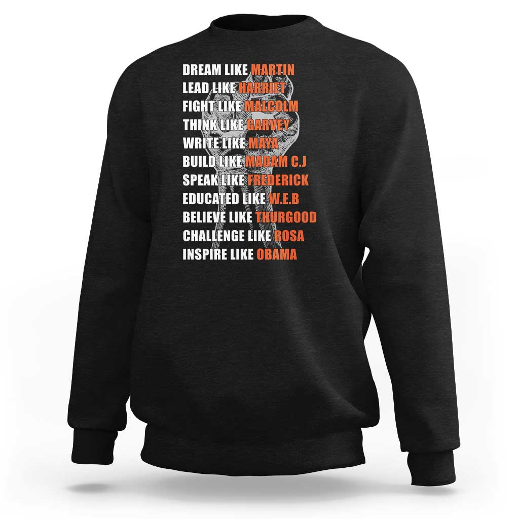Black crewneck sweatshirt with inspirational quote graphic on chest