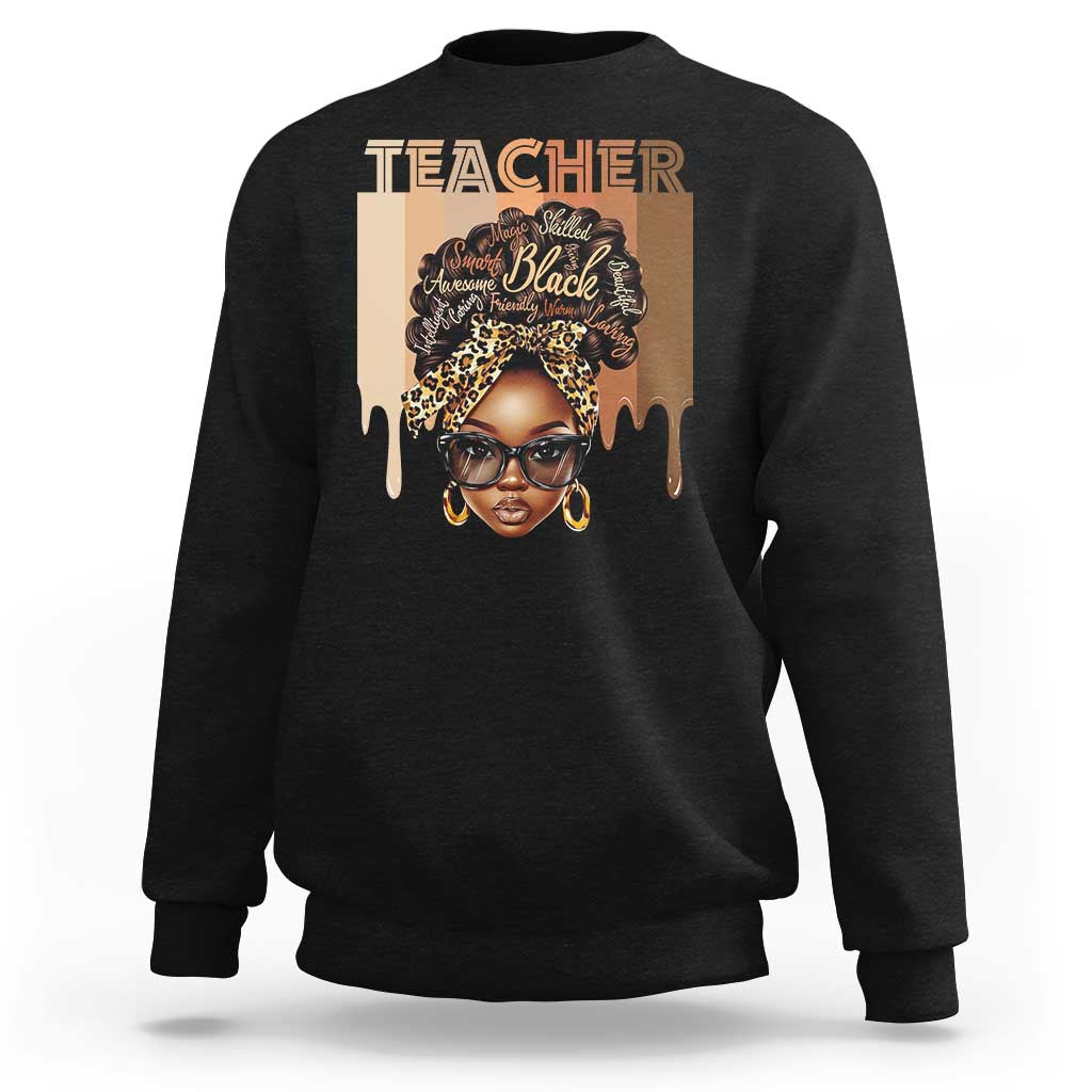 Black crewneck sweatshirt with front graphic portrait and Teacher text