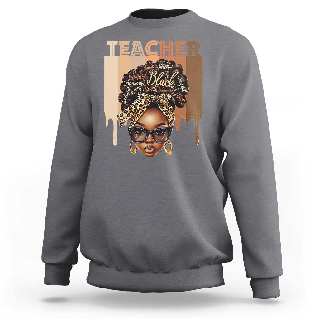 Charcoal gray crewneck sweatshirt with front graphic portrait and Teacher text