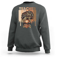 Dark heather gray crewneck sweatshirt with front graphic portrait and Teacher text