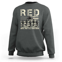 Olive green crewneck sweatshirt with soldier and stars-and-stripes graphic across chest