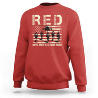Red crewneck sweatshirt with soldier and stars-and-stripes graphic across chest