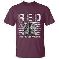 Maroon T-shirt with large printed boots graphic and “UNTIL THEY ALL COME HOME” text