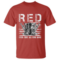 Red T-shirt with printed boots graphic and “UNTIL THEY ALL COME HOME” text