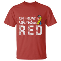 Red T-shirt with 'ON FRIDAY' front print, ribbon and football graphic