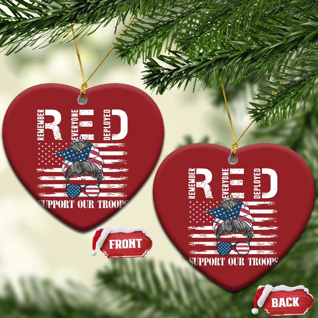 Red heart-shaped Christmas ornaments with gold loops and “Support Our Troops” graphic