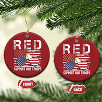 Set of red round Christmas ornaments with gold strings, eagle, flags, "Support Our Troops"
