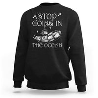 Black crewneck sweatshirt with “Stop Going In The Ocean” submarine graphic on chest