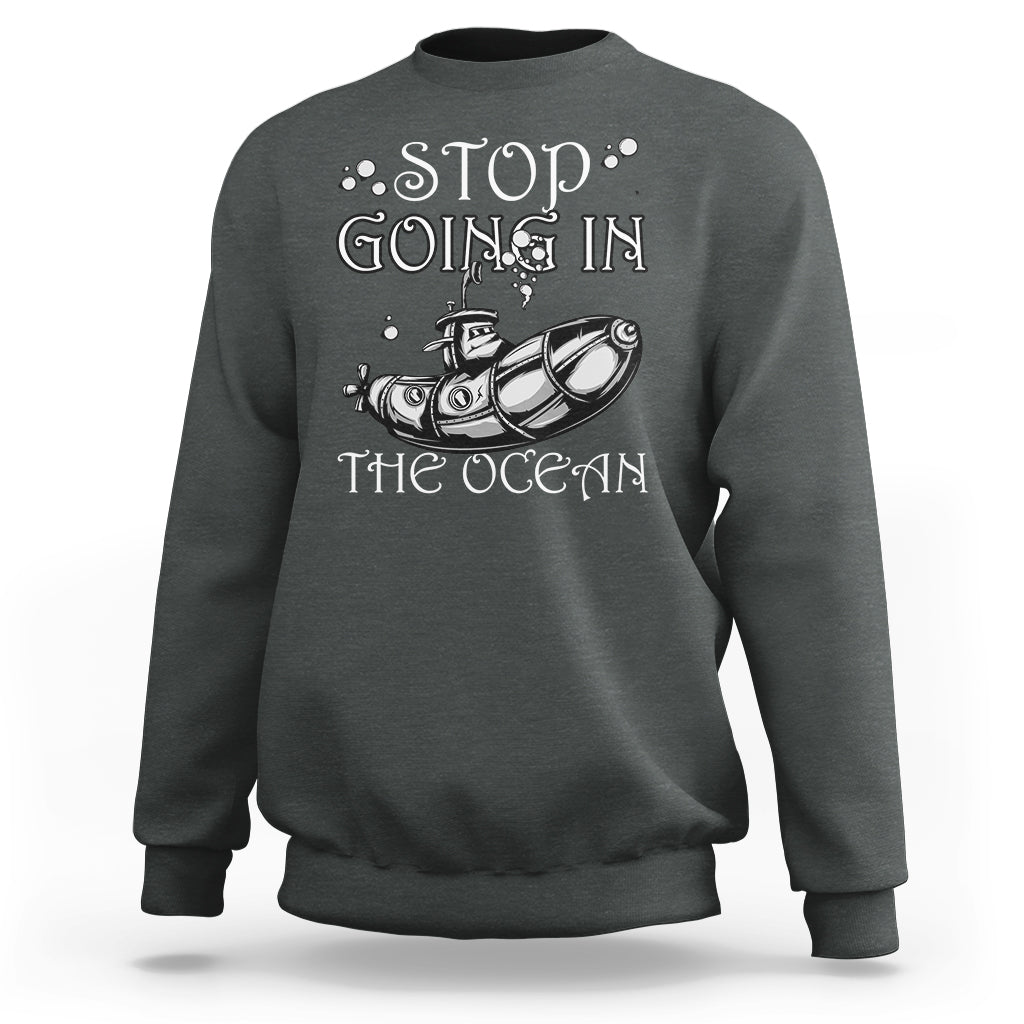 Dark heather crewneck sweatshirt with “Stop Going In The Ocean” submarine graphic on chest