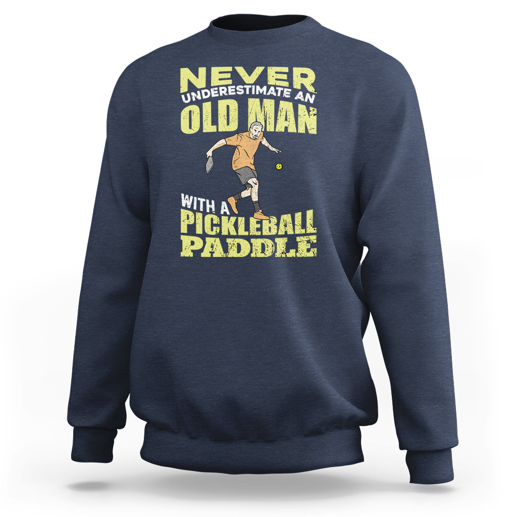 Navy sweatshirt with crew neck and front pickleball paddler graphic