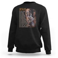 Black faith sweatshirt with Jesus portrait and scripture text graphic on chest