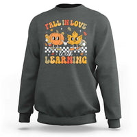 Charcoal crewneck sweatshirt with fall learning cartoon graphic on chest