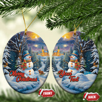 Pair of blue ceramic oval Christmas ornaments with snowman, winter village, Merry Christmas/Your Text
