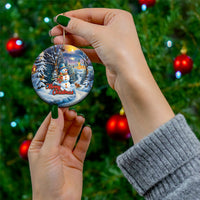 Blue ceramic round Christmas ornament with snowman and winter village, Merry Christmas text