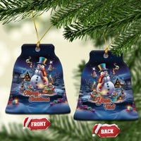 Blue ceramic snowman ornament with gold loop, bell-shaped, circular scene, “Merry Christmas”
