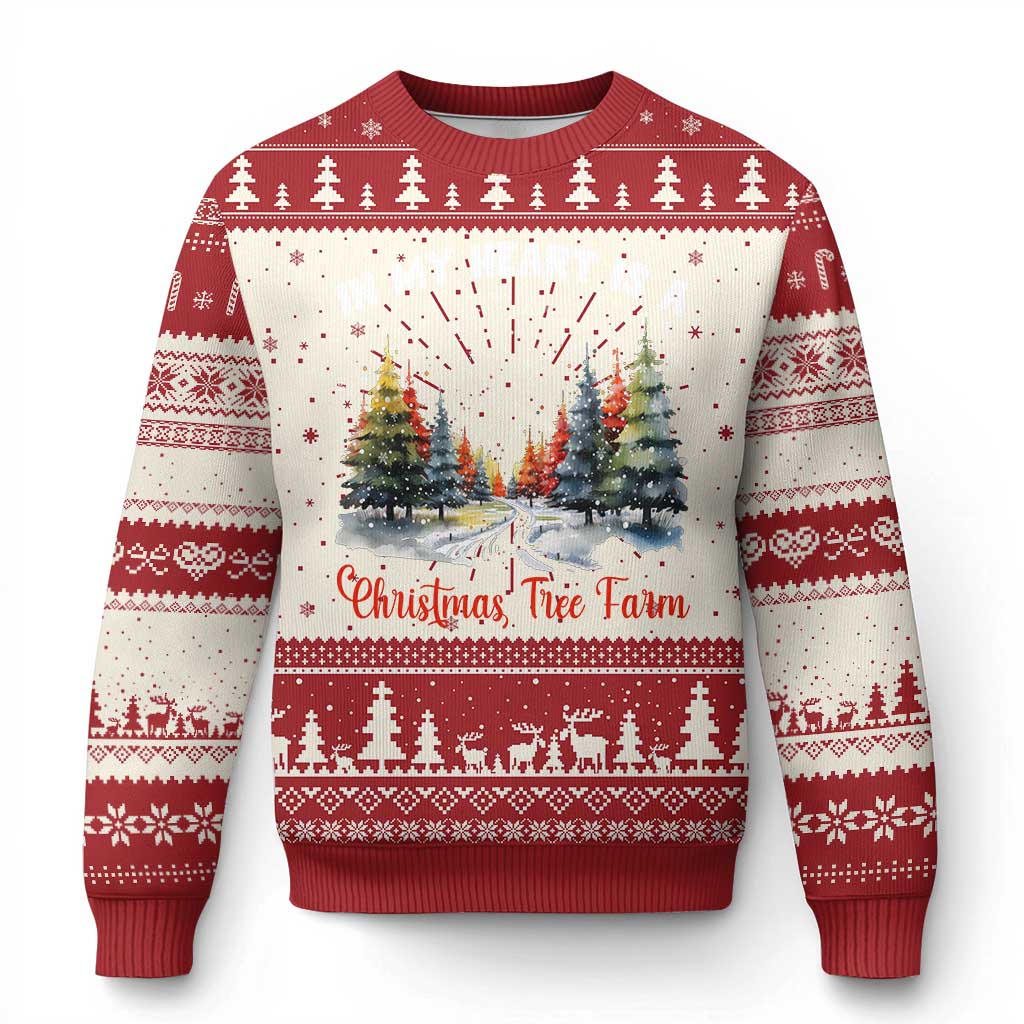 Red knit Christmas sweater with tree village graphic, fair isle bands, ribbed crewneck.