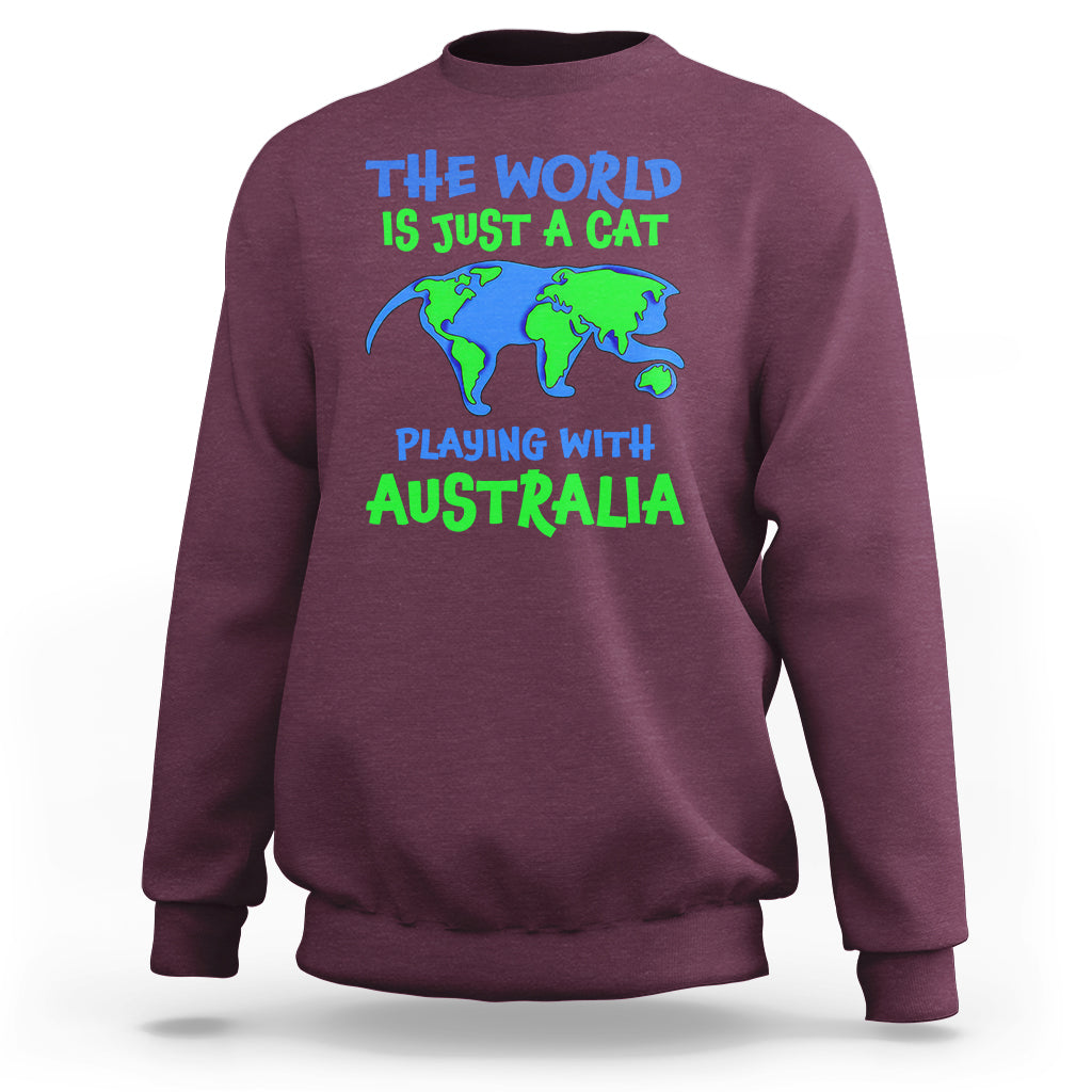 Maroon crewneck sweatshirt with cat-and-Australia world graphic on front