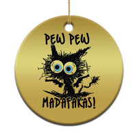 Gold round Christmas ornament with cartoon burnt cat, blue eyes, 'PEW PEW' and 'MADAFakasi'