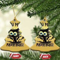 Gold bell-shaped Christmas ornaments with cartoon burnt cat and blue eyes, 'MADAFakasi', front/back