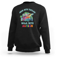 Black crewneck sweatshirt with colorful turtle and autism acceptance graphic on chest