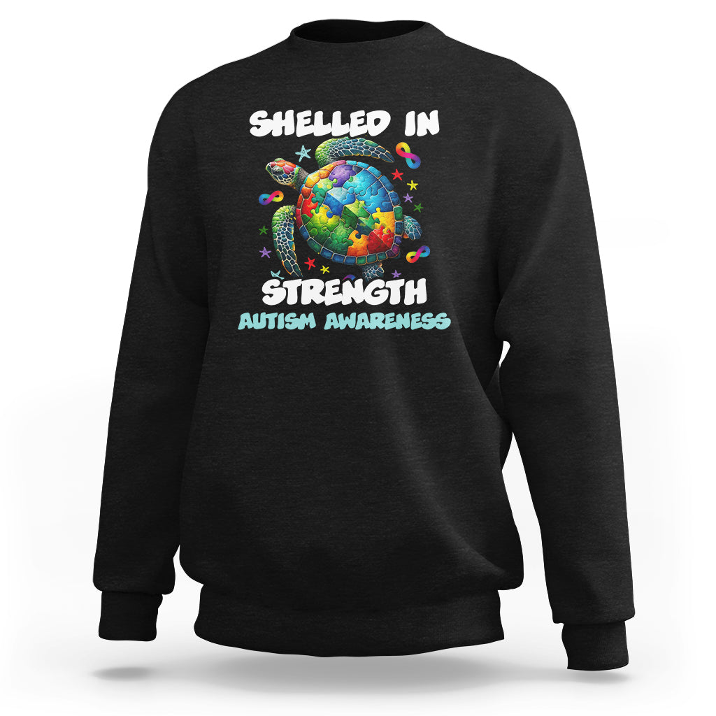 Black autism awareness sweatshirt with turtle globe “Shelled In Strength” front print