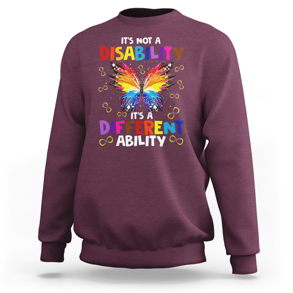 Maroon crewneck autism sweatshirt with rainbow butterfly slogan graphic
