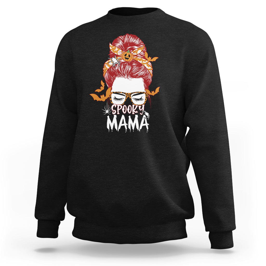 Black Halloween sweatshirt with colorful “Spooky Mama” graphic on the chest