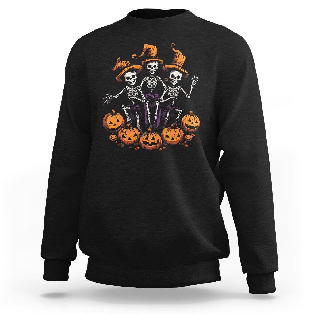 Black Halloween sweatshirt with dancing skeleton trio and jack-o'-lantern graphic
