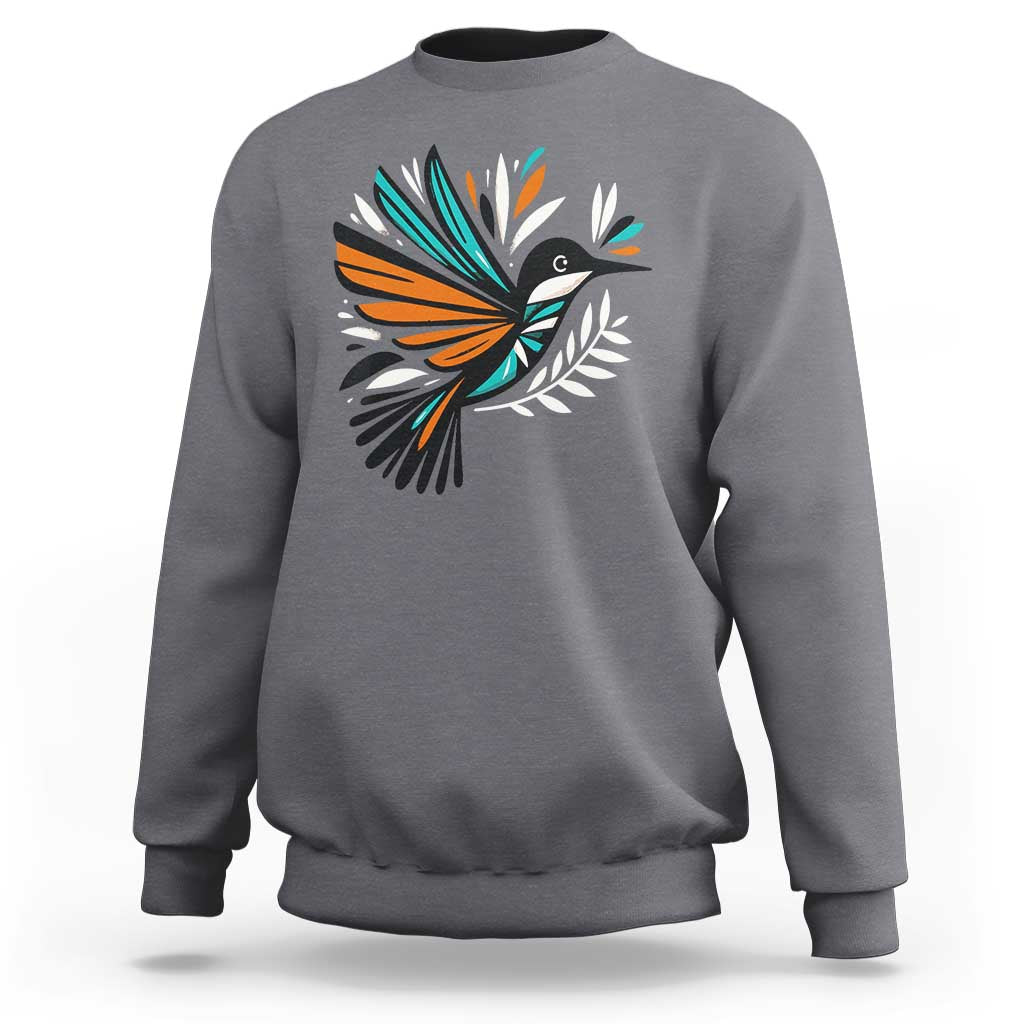 Dark gray kids sweatshirt with colorful bird and feather graphic on the front