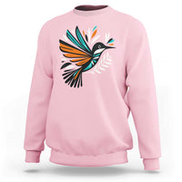 Light pink kids sweatshirt with colorful bird and feather graphic on the front
