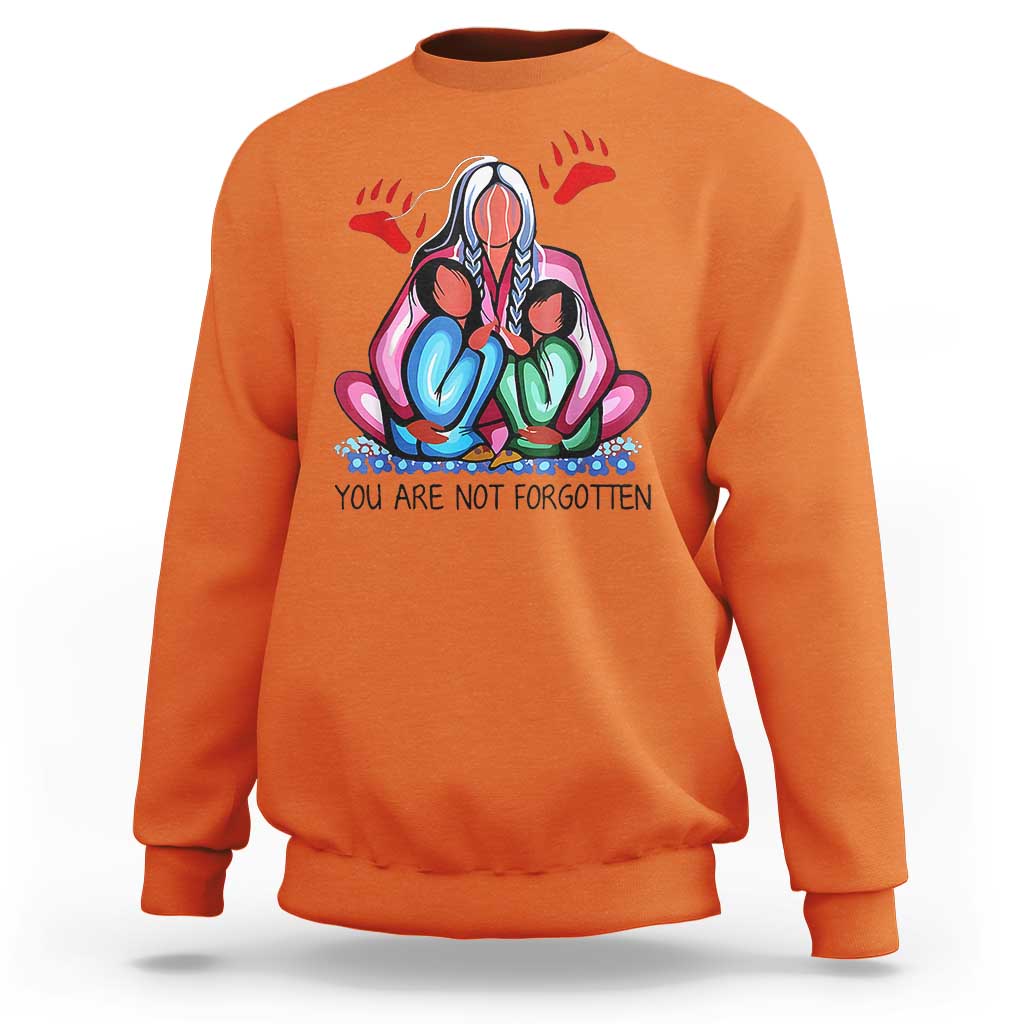 Orange child sweatshirt with front graphic and text "YOU ARE NOT FORGOTTEN"