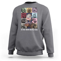 Dark heather gray crewneck sweatshirt with colorful hippo graphic on front