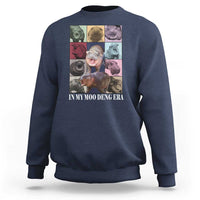Navy crewneck sweatshirt with colorful hippo graphic on front