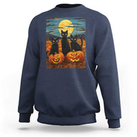 Navy Halloween cat sweatshirt with night-sky artwork and jack-o’-lanterns