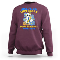 Maroon crewneck sweatshirt with colorful Down syndrome awareness ghost graphic on chest