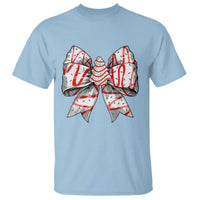 Light blue short-sleeve T-shirt with candy cane bow graphic on chest