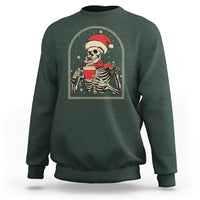 Dark forest green crewneck Christmas skeleton sweatshirt with front graphic and holiday coffee mug