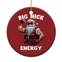 Red round Christmas ornament with Santa illustration and text "BIG NICK ENERGY"