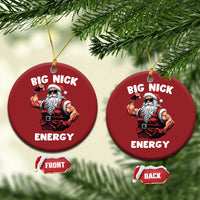 Red round Santa ornament set reading "BIG NICK ENERGY", with front and back labels