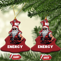 Red bell-shaped Santa ornaments showing "BIG NICK ENERGY" and front/back labels