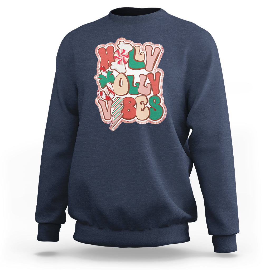 Navy crewneck sweatshirt with colorful 'joy' holiday graphic on front.