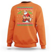 Orange crewneck sweatshirt with Santa cartoon and festive holiday stripe graphic