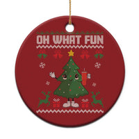 Red round Christmas ornament with "Oh What Fun" and a cartoon Christmas tree