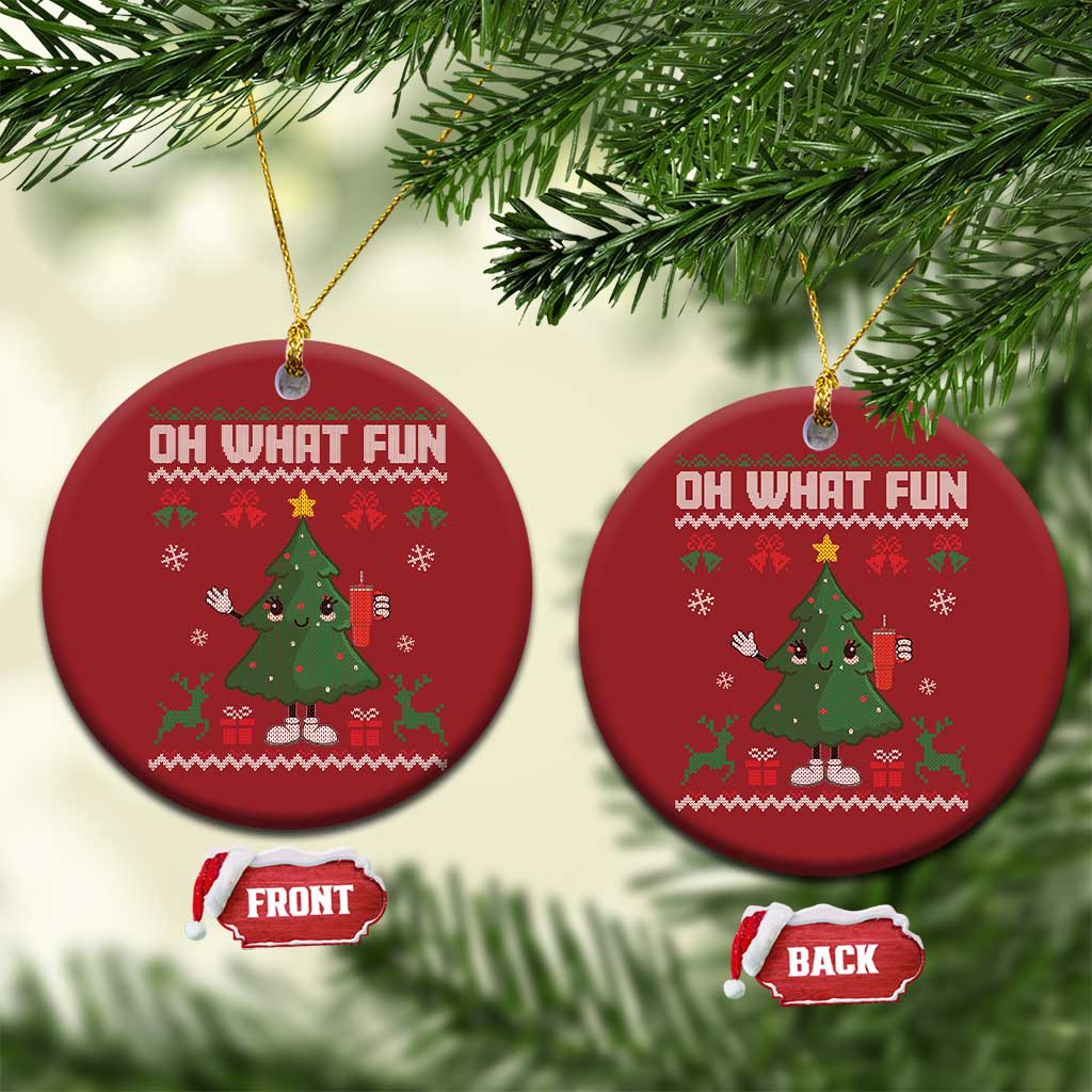 Two red round Christmas ornaments hanging on branches, each with "Oh What Fun" tree