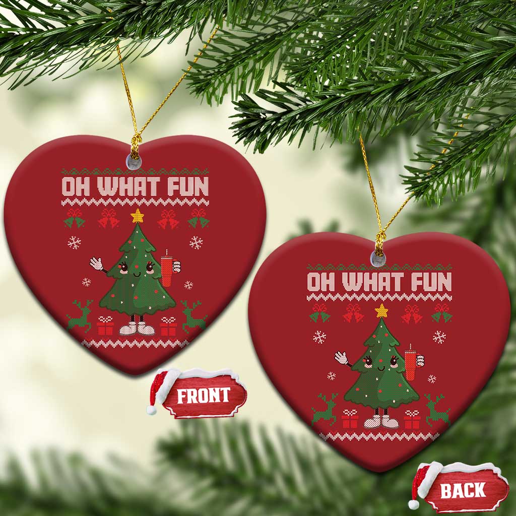 Two red heart Christmas ornaments with "Oh What Fun" and a cartoon Christmas tree