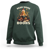 Dark forest green gingerbread reading sweatshirt with 'Read More Books' graphic