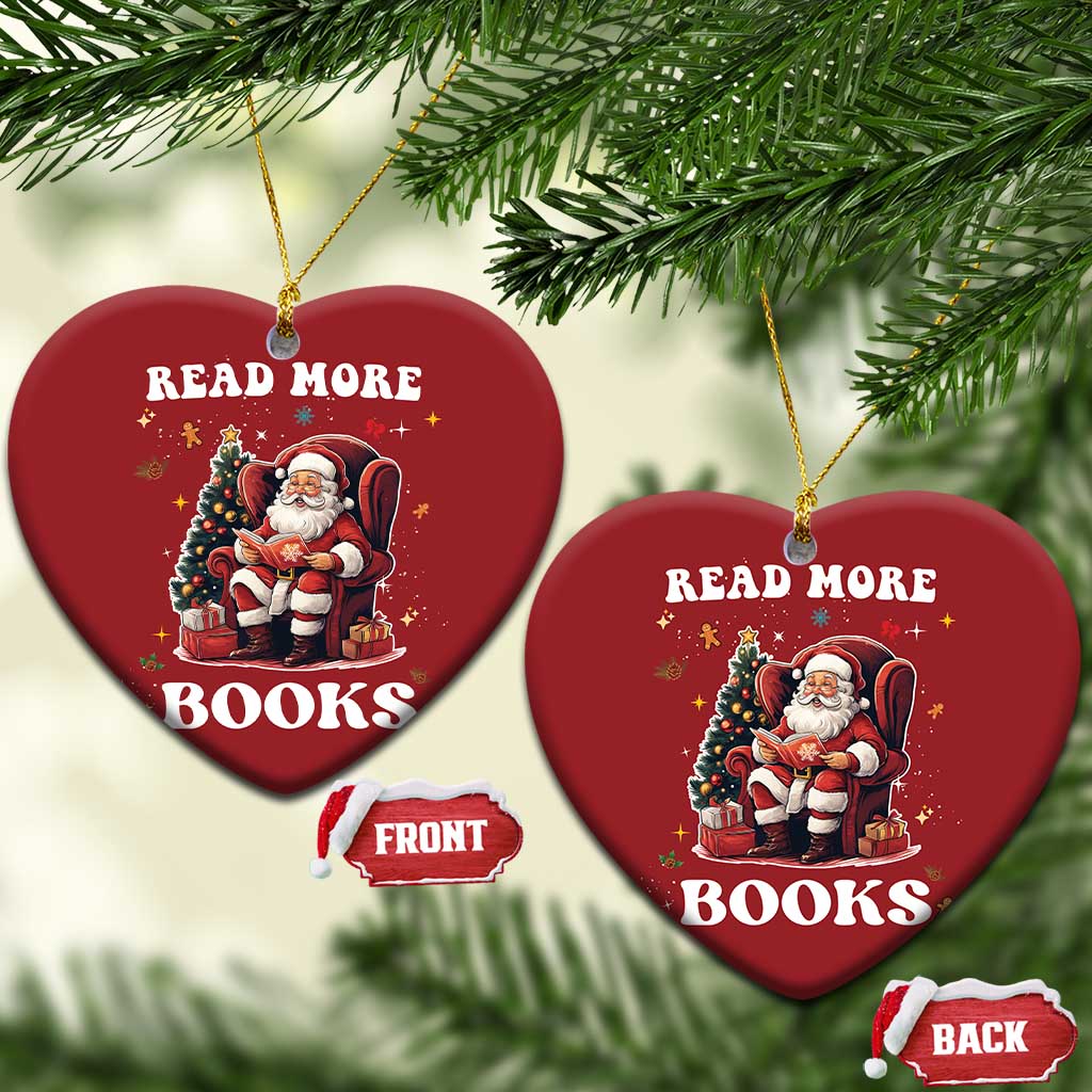 Two red heart-shaped Christmas ornaments: Santa reading “READ MORE BOOKS” front and back